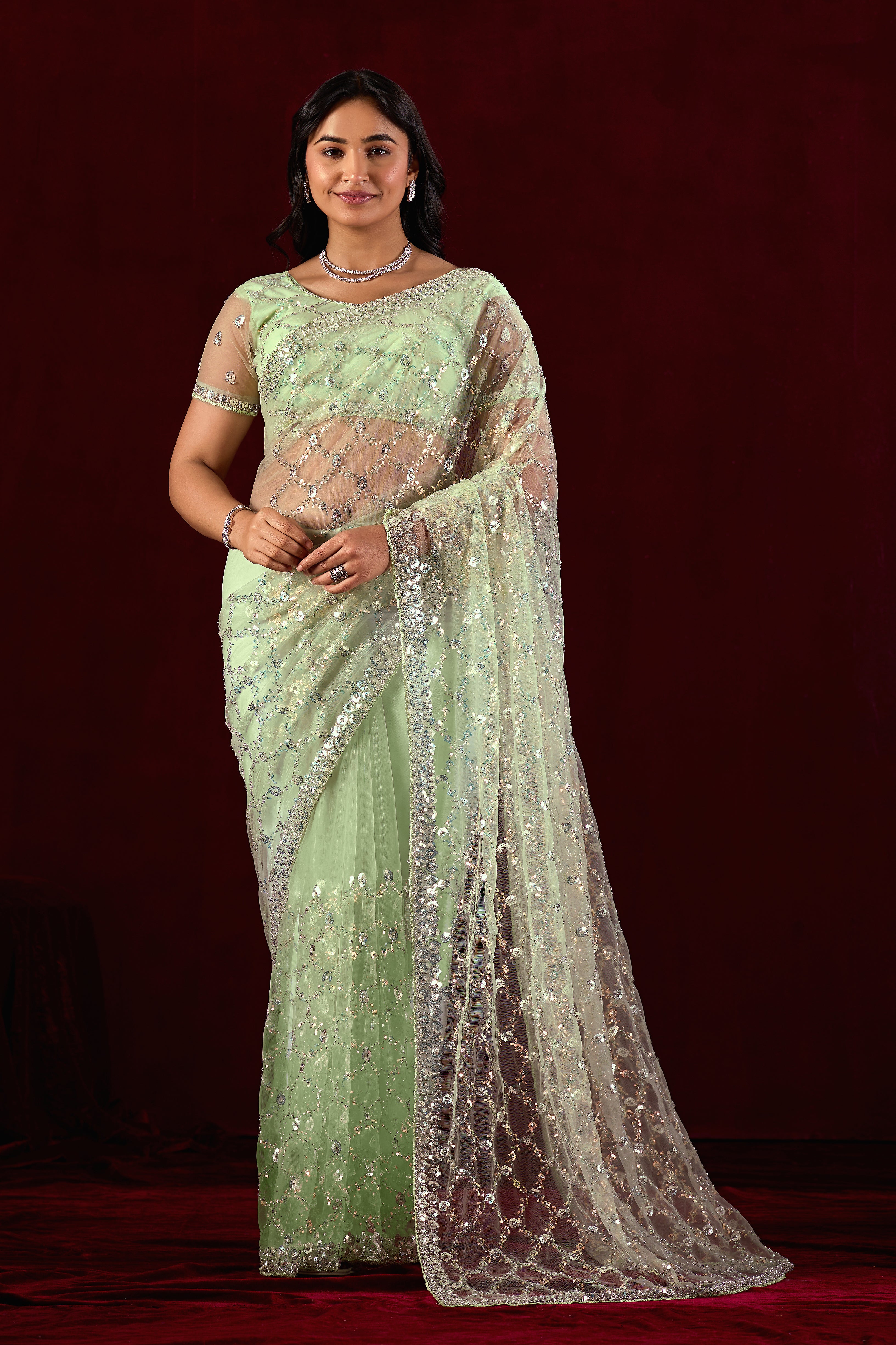 Saajvi Net Embroidered Saree with Sequin Work & Designer Blouse